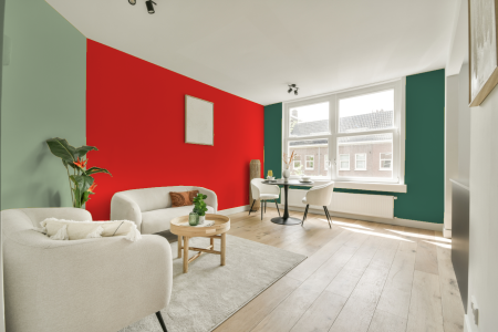 kamer in kleur Ral 3026 met designkleuren op de wanden