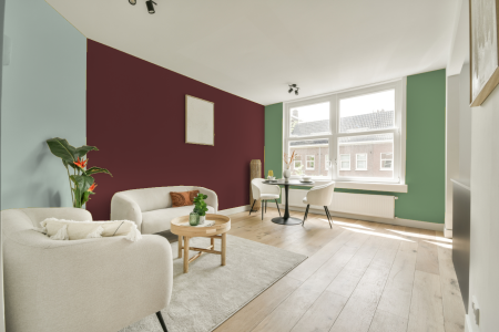 kamer in kleur Ppg1055-7 met designkleuren op de wanden