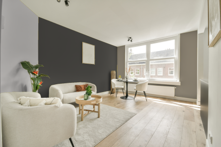 woonkamer met neutrale kleuren en Gn 115-02